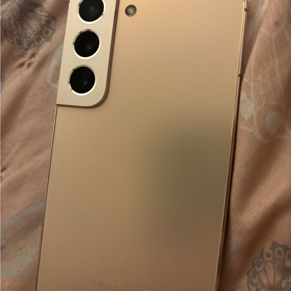 Gold Smartphone with Triple Camera